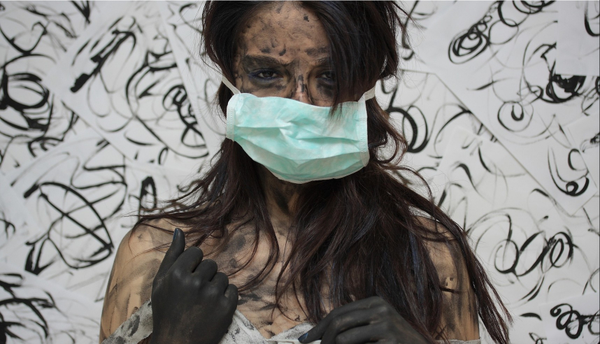 Female doctor looking defeated, broken, covered in dirt