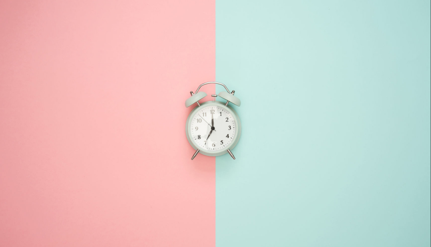 Clock on split background, going part time